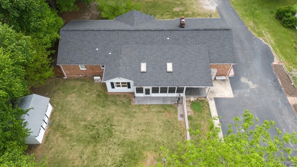 13012 Harrowgate Road Chester, VA 23831 - Photo 3 of 28 an aerial view of a house with swimming pool