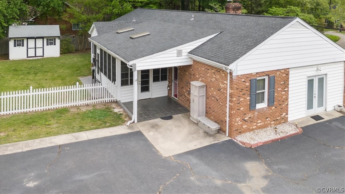 13012 Harrowgate Road Chester, VA 23831 - Photo 5 of 28 a view of a house with wooden fence