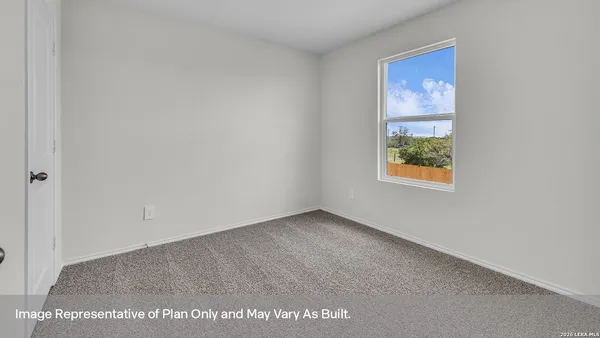 an empty room with window