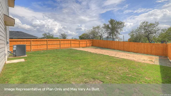 a view of an outdoor space and basketball court