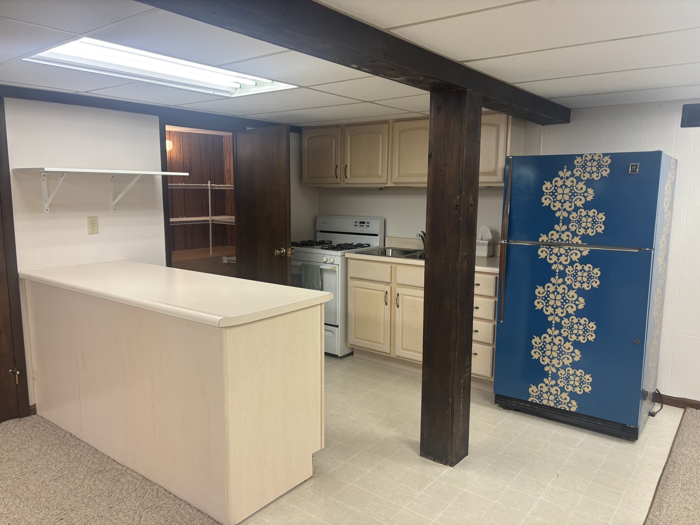 320 North Main Street Roanoke, IL 61561 - Photo 21 of 23 a kitchen with a refrigerator and a stove