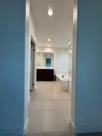 a view of a swimming pool with an outdoor seating and a yard