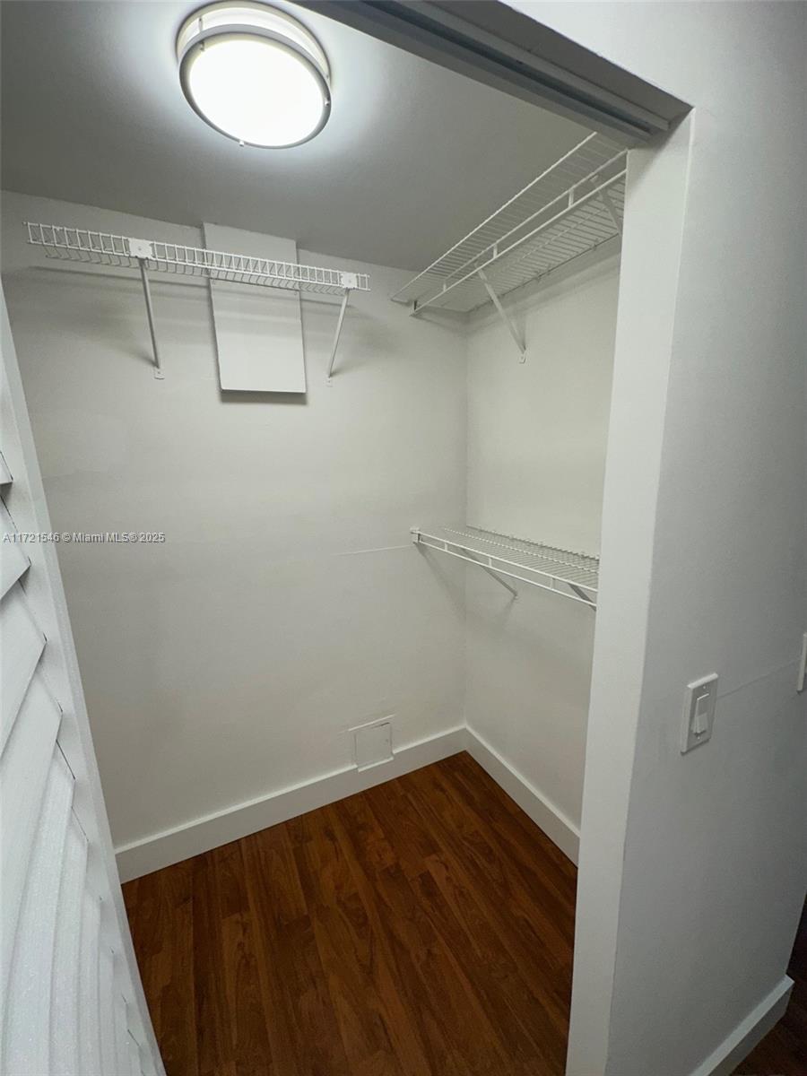 1666 West Avenue, Unit 512 Miami Beach, FL 33139 - Photo 20 of 20 a view of a room with wooden floor and a window