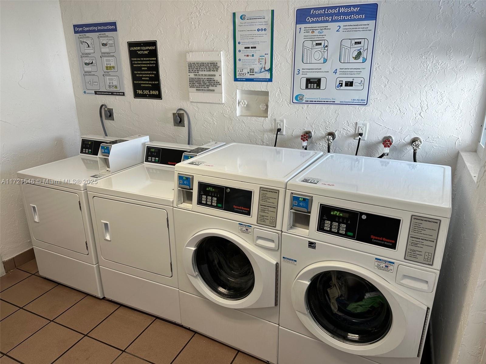 1666 West Avenue, Unit 512 Miami Beach, FL 33139 - Photo 9 of 20 a utility room with dryer and washer