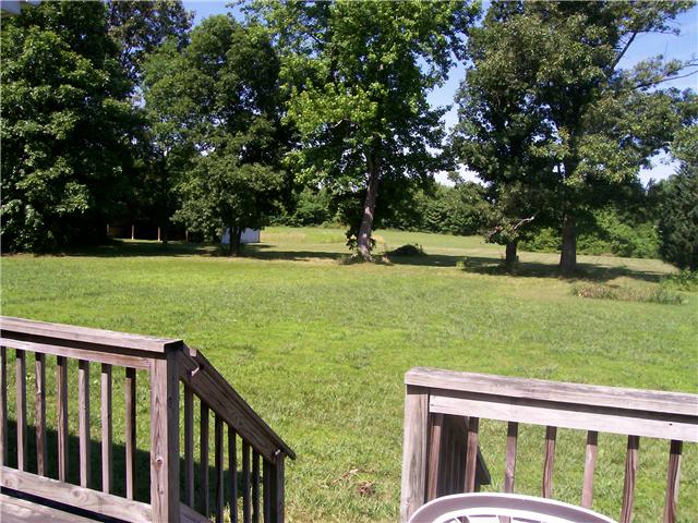 1198 Smith Thompson Road Bethpage, TN 37022 - Photo 5 of 20 a view of outdoor space with deck and yard
