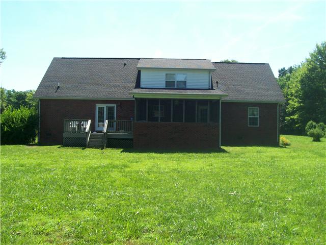 1198 Smith Thompson Road Bethpage, TN 37022 - Photo 6 of 20 a front view of a house with a yard