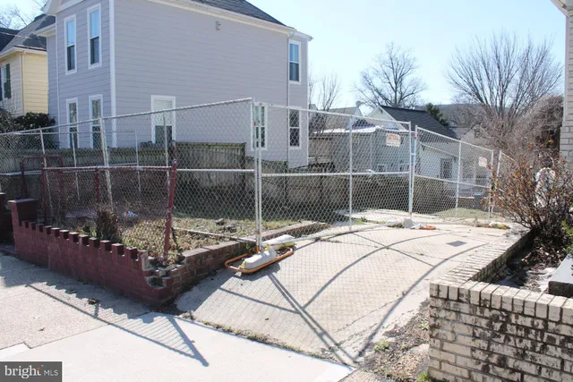 a view of outdoor living space with patio