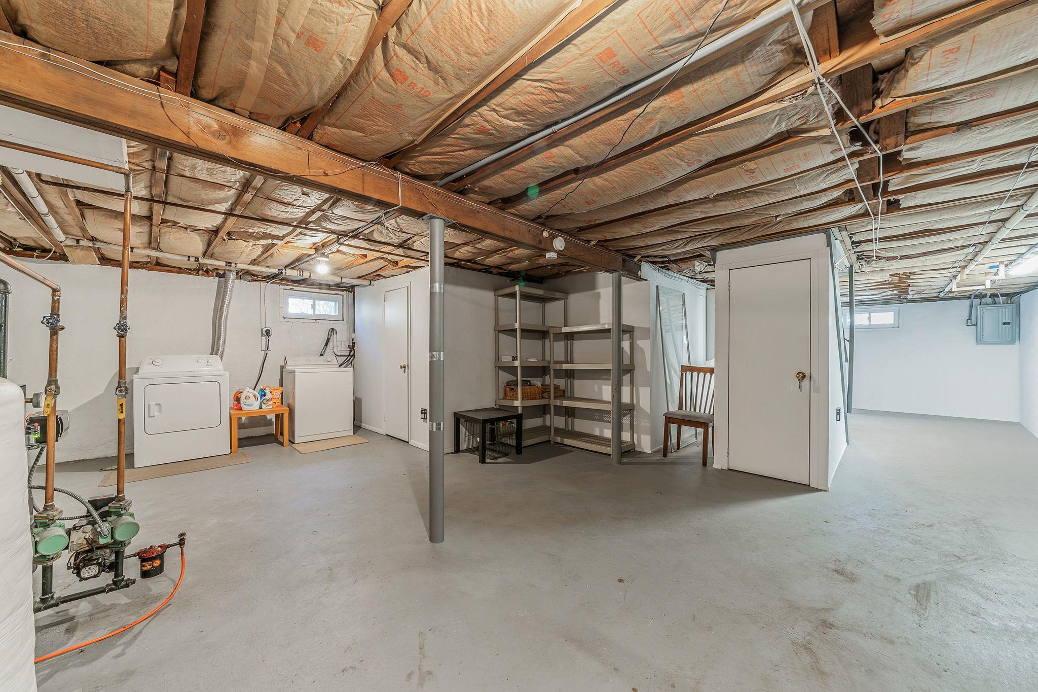 3 Crestview Drive Remsenburg, NY 11960 - Photo 11 of 24 a view of empty room with wooden ceiling