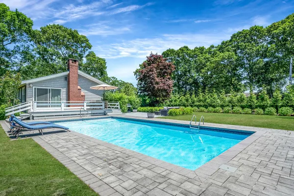 a view of a house with a swimming pool