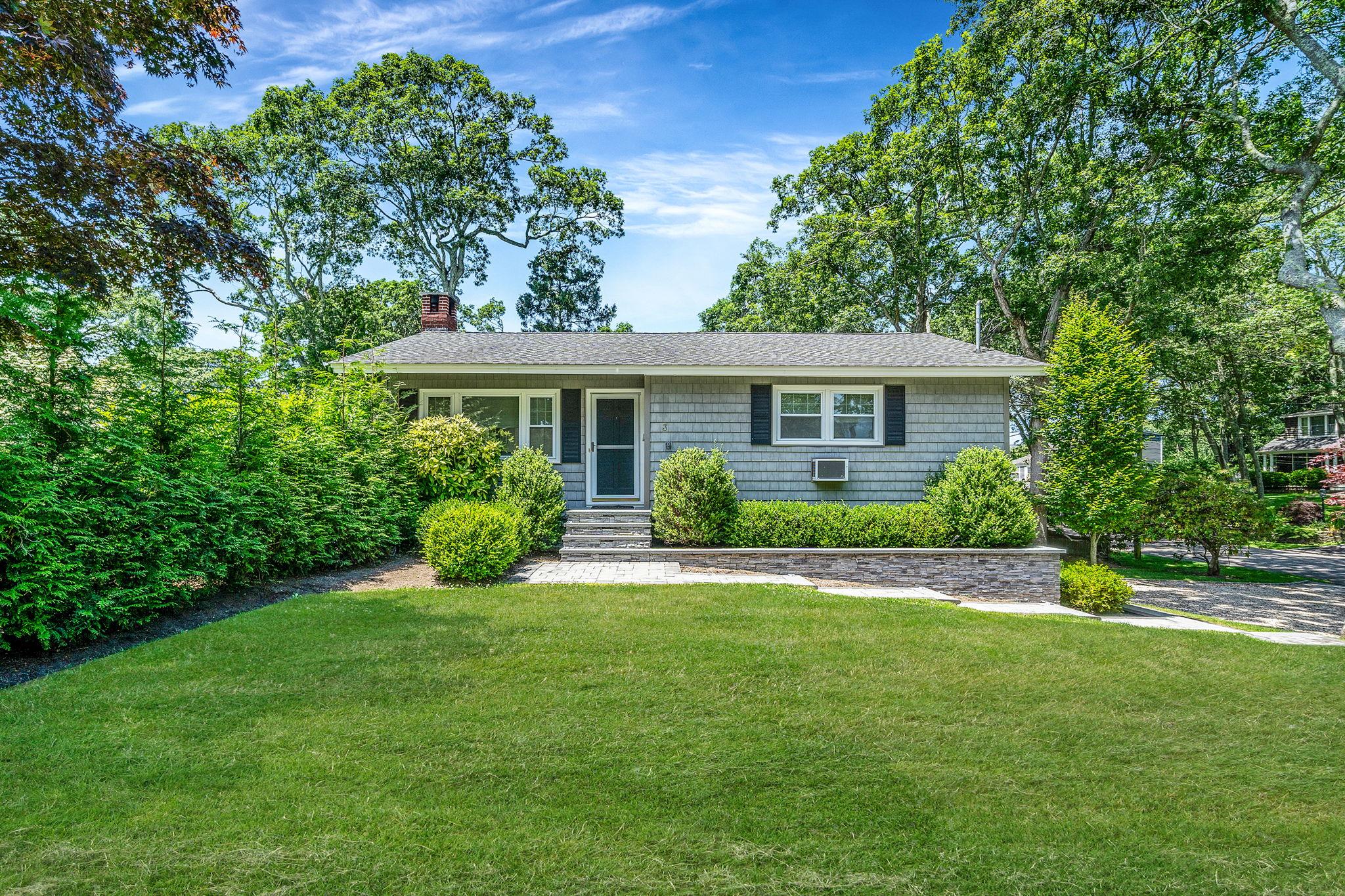 3 Crestview Drive Remsenburg, NY 11960 - Photo 2 of 24 a view of an house that has garden