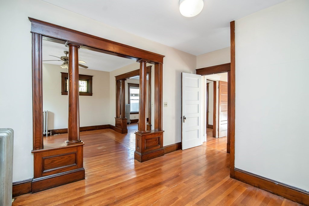84 Orange Street Springfield, MA 01108 - Photo 20 of 42 a view of interior space with wooden floor and windows