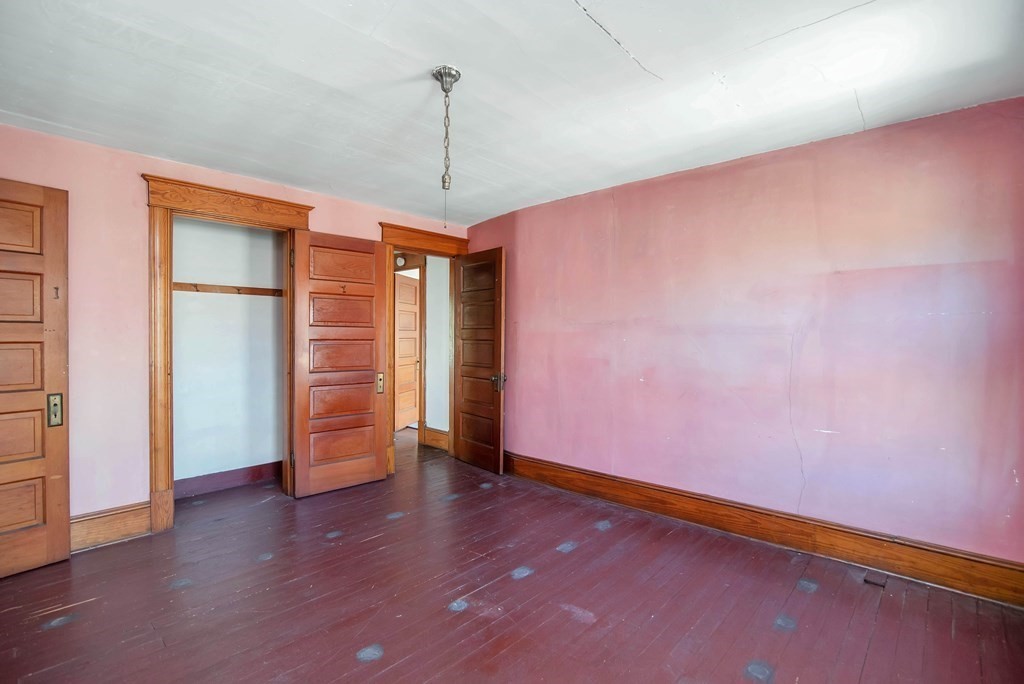 84 Orange Street Springfield, MA 01108 - Photo 33 of 42 a view of an empty room with a window