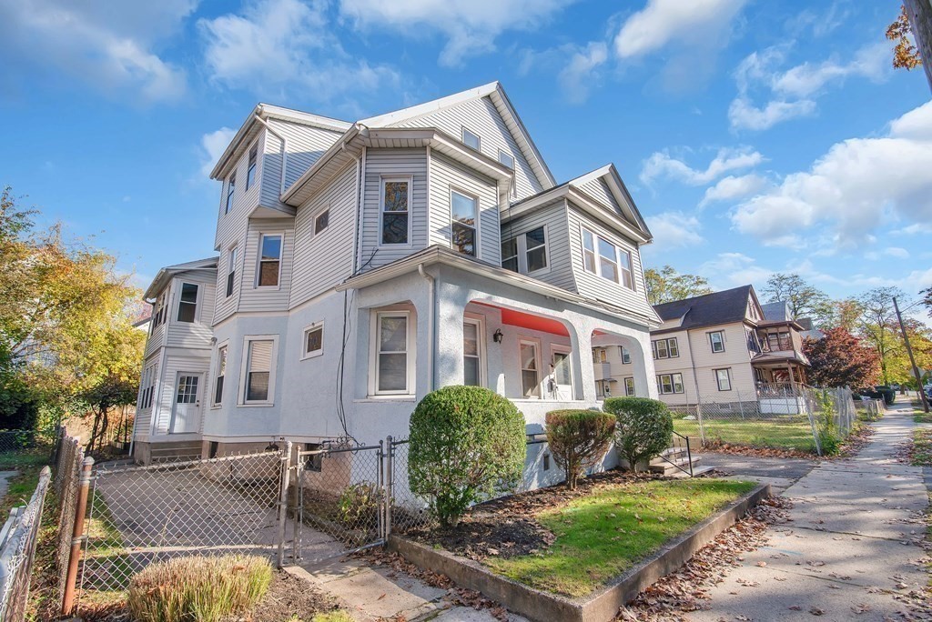 84 Orange Street Springfield, MA 01108 - Photo 41 of 42 a front view of a house with garden