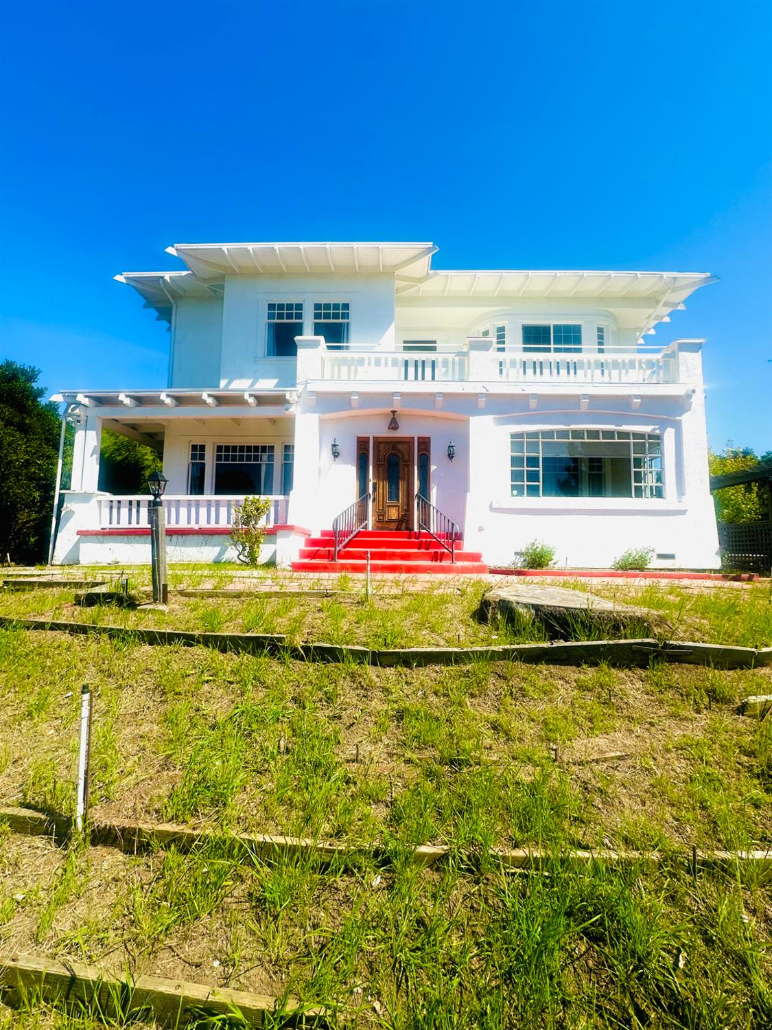 a view of an swimming pool with an outdoor seating