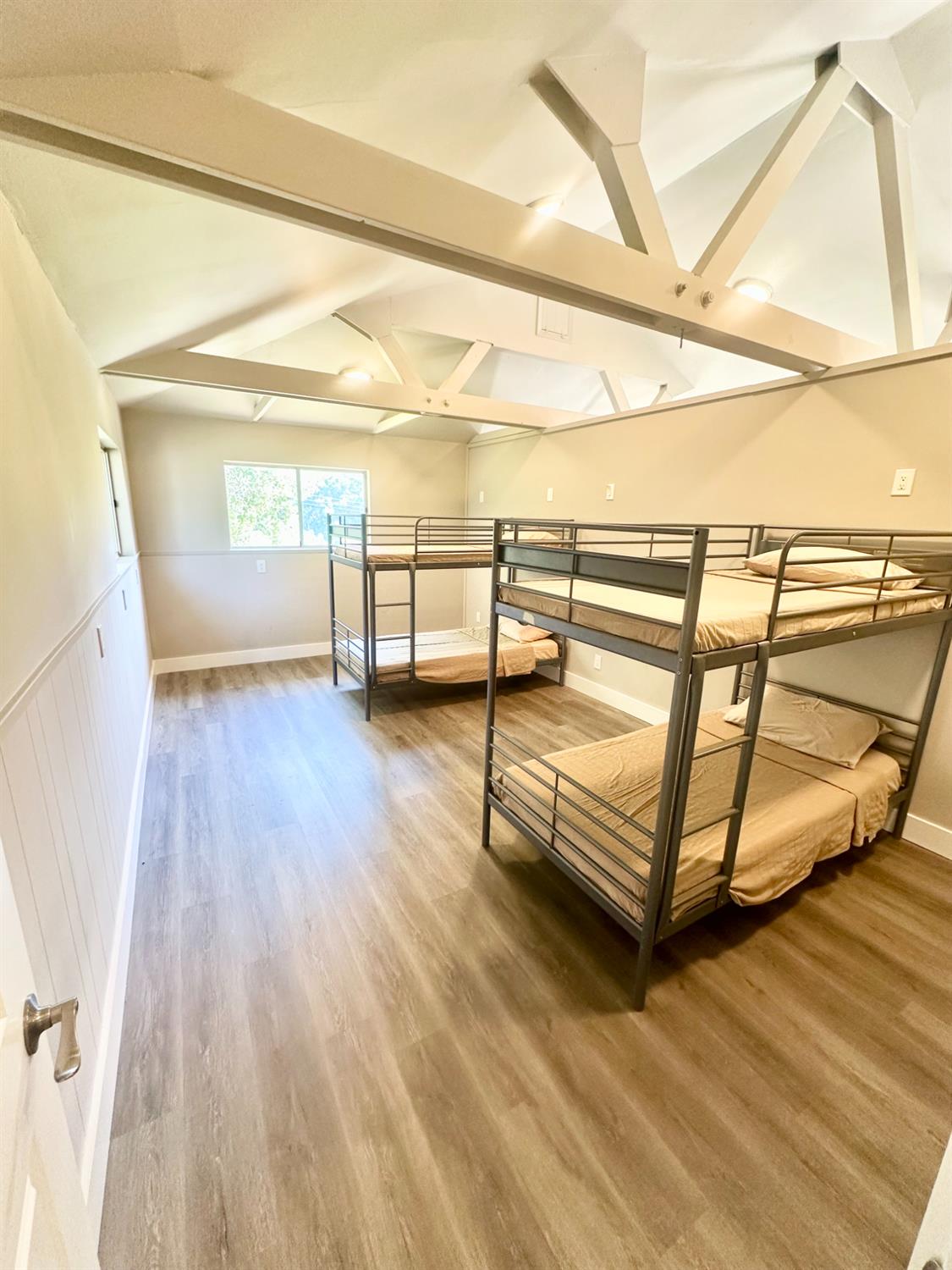 1556 E Street Hayward, CA 94541 - Photo 43 of 65 a view of a room with racks on the wall