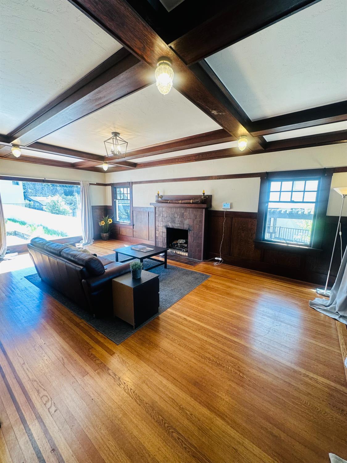 1556 E Street Hayward, CA 94541 - Photo 5 of 65 a living room with furniture and a wooden floor