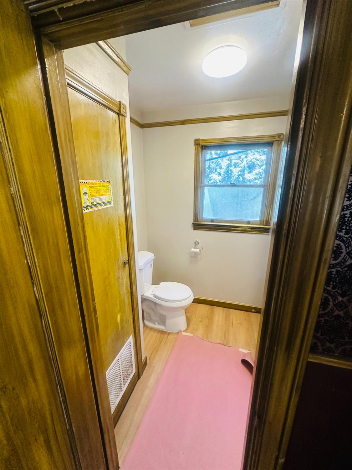 1556 E Street Hayward, CA 94541 - Photo 52 of 65 a bathroom with a sink and a mirror
