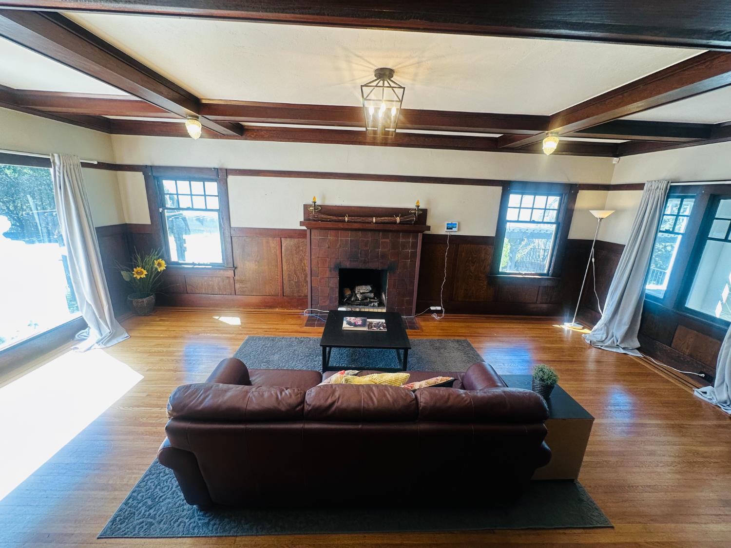 1556 E Street Hayward, CA 94541 - Photo 6 of 65 a living room with furniture and a fireplace