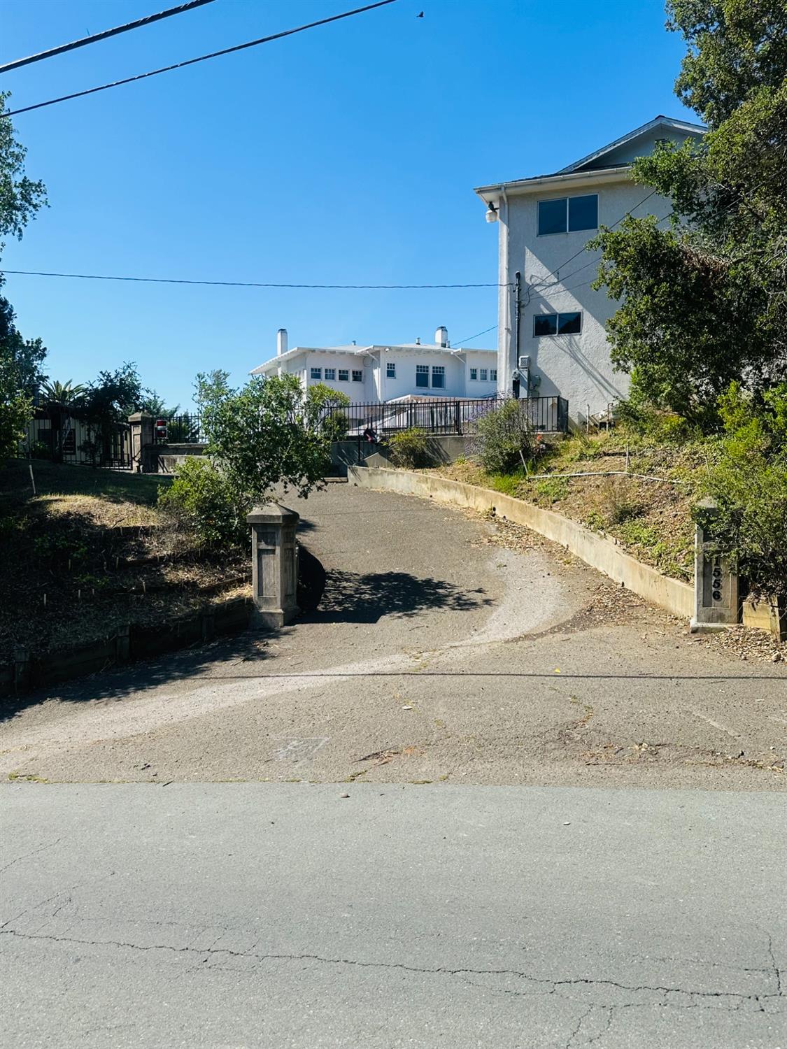 1556 E Street Hayward, CA 94541 - Photo 64 of 65 front view of a house with a yard