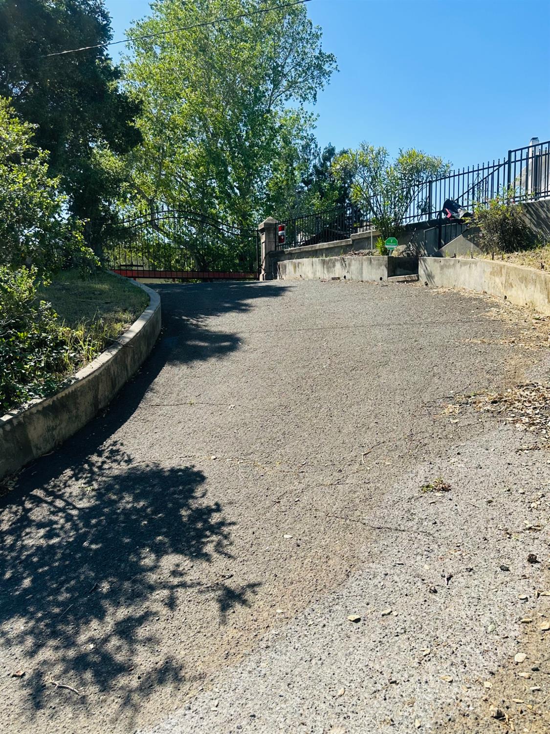 1556 E Street Hayward, CA 94541 - Photo 65 of 65 a view of a lake with a bench and trees around