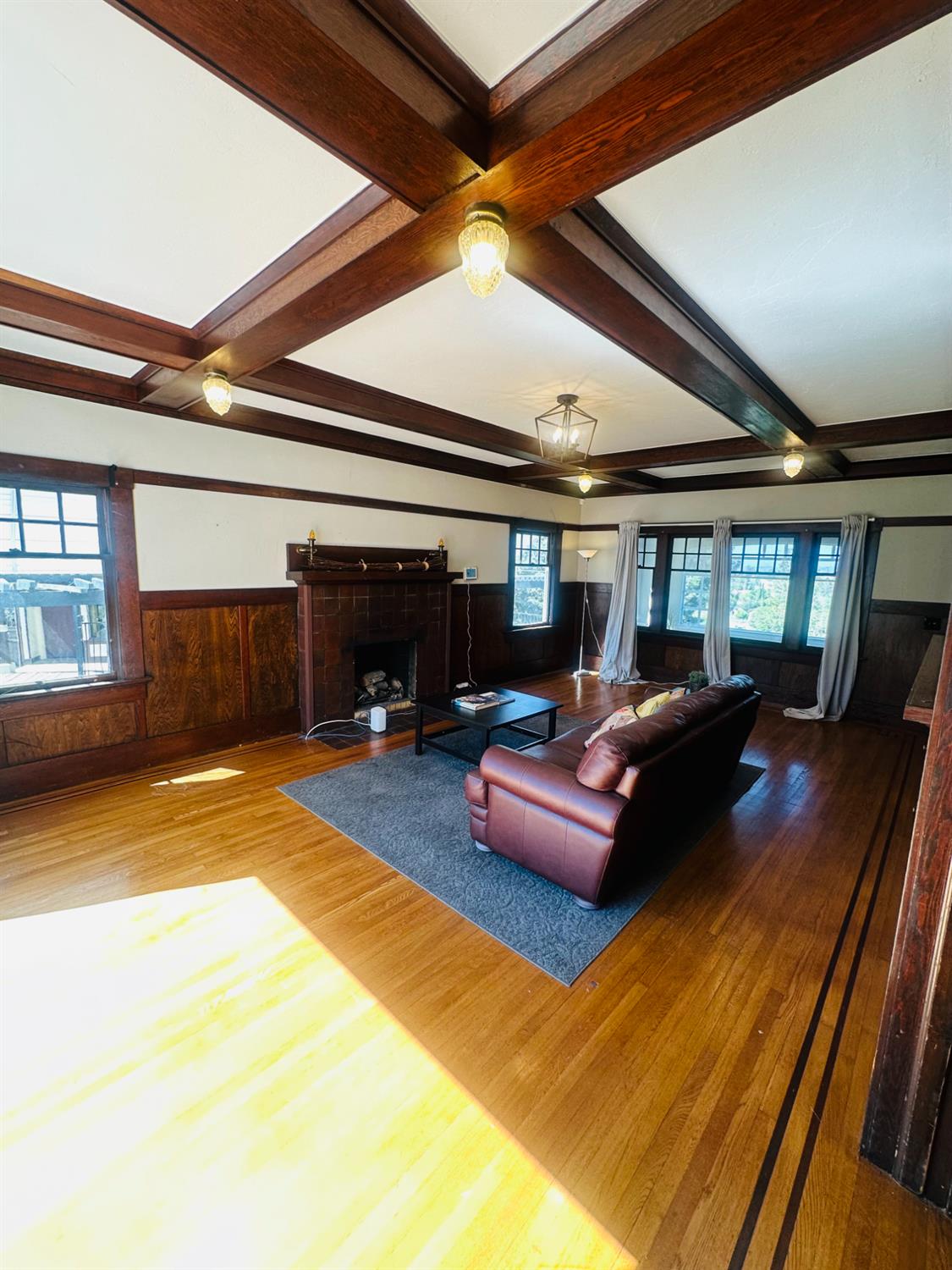 1556 E Street Hayward, CA 94541 - Photo 7 of 65 a living room with furniture and a rug