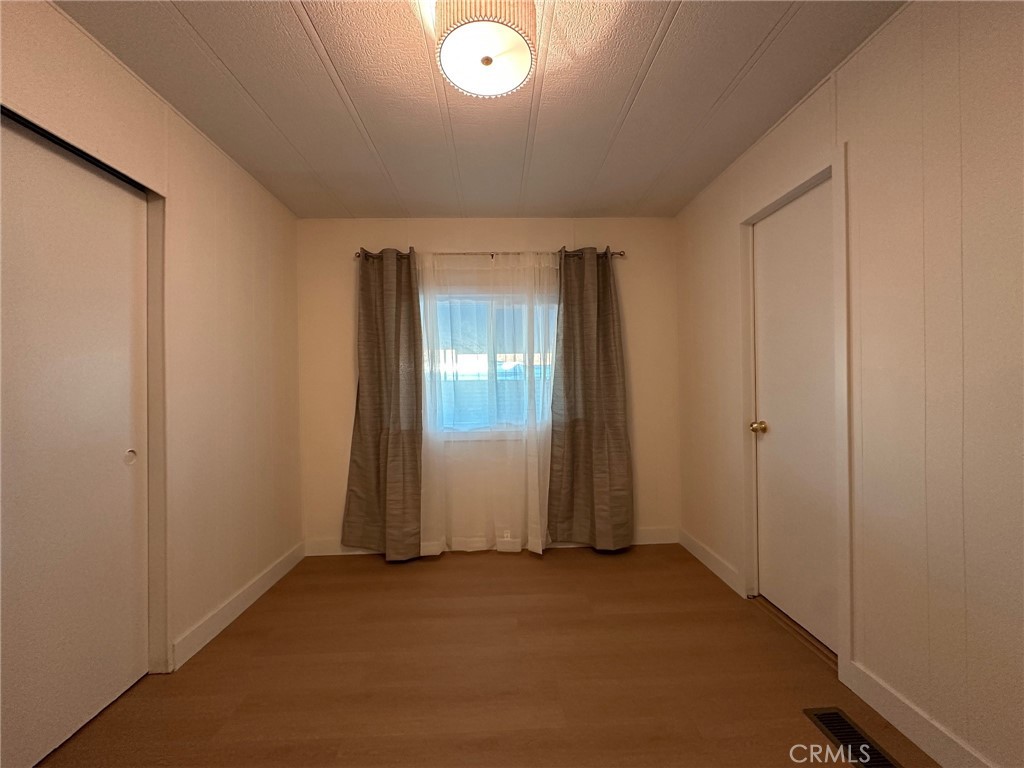 650-291 South Rancho Santa Fe Road San Marcos, CA 92078 - Photo 26 of 40 an empty room with windows