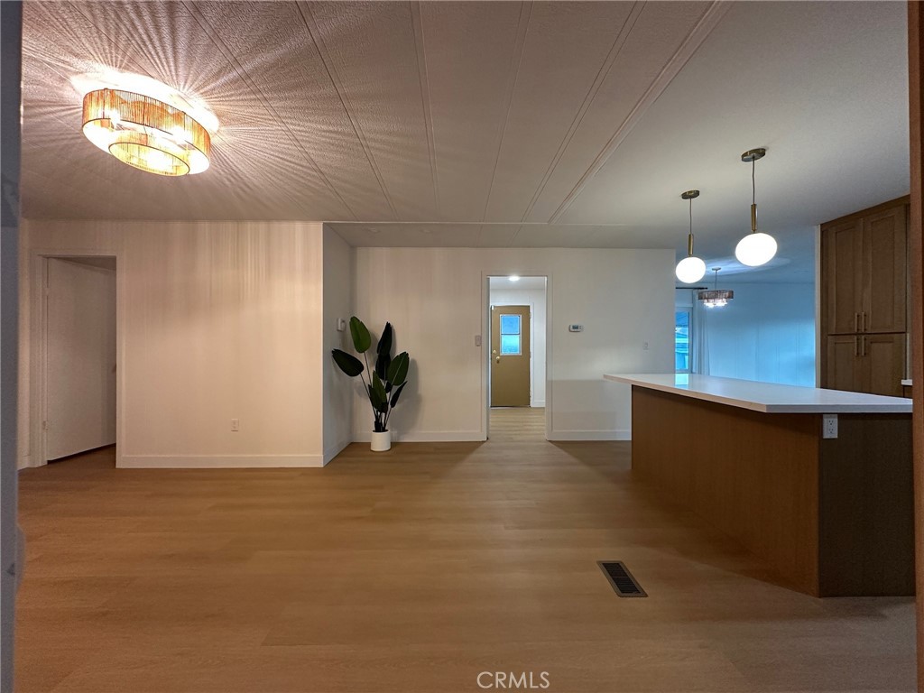 650-291 South Rancho Santa Fe Road San Marcos, CA 92078 - Photo 3 of 40 a view of a kitchen with a sink and a dishwasher