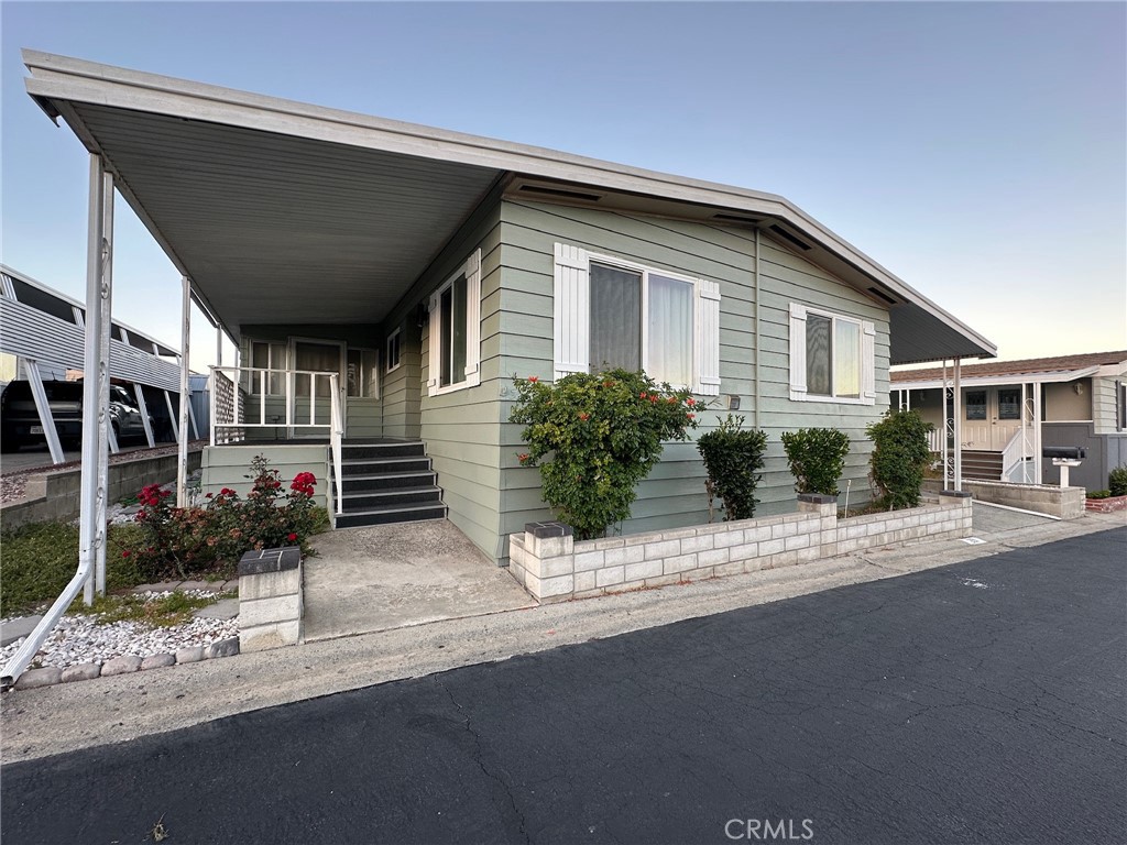 650-291 South Rancho Santa Fe Road San Marcos, CA 92078 - Photo 37 of 40 a view of a house with a street