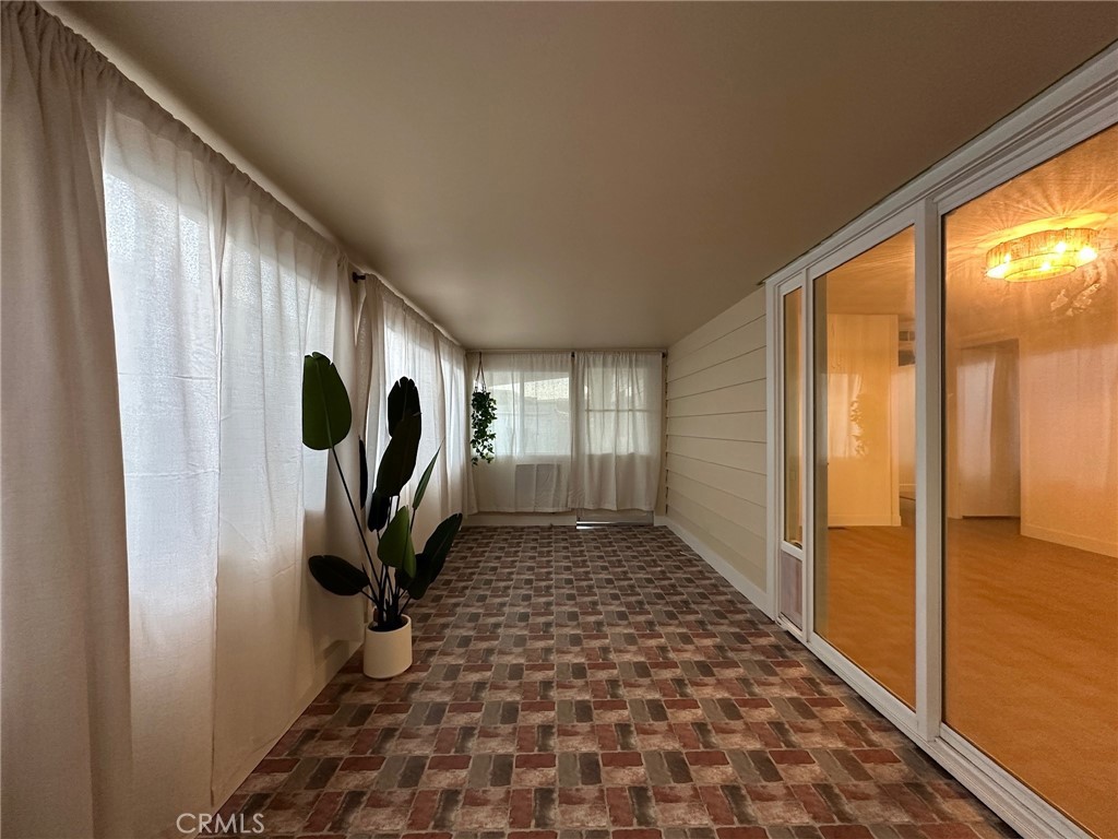 650-291 South Rancho Santa Fe Road San Marcos, CA 92078 - Photo 9 of 40 a view of a entryway door with wooden floor