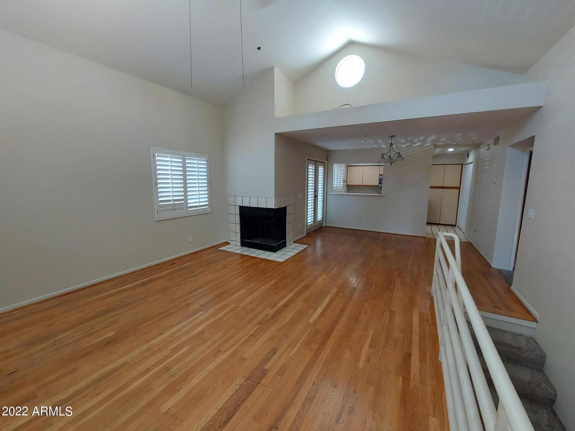 154 West 5th Street, Unit 246 Tempe, AZ 85281 - Photo 3 of 4 wooden floor in an empty room with a window