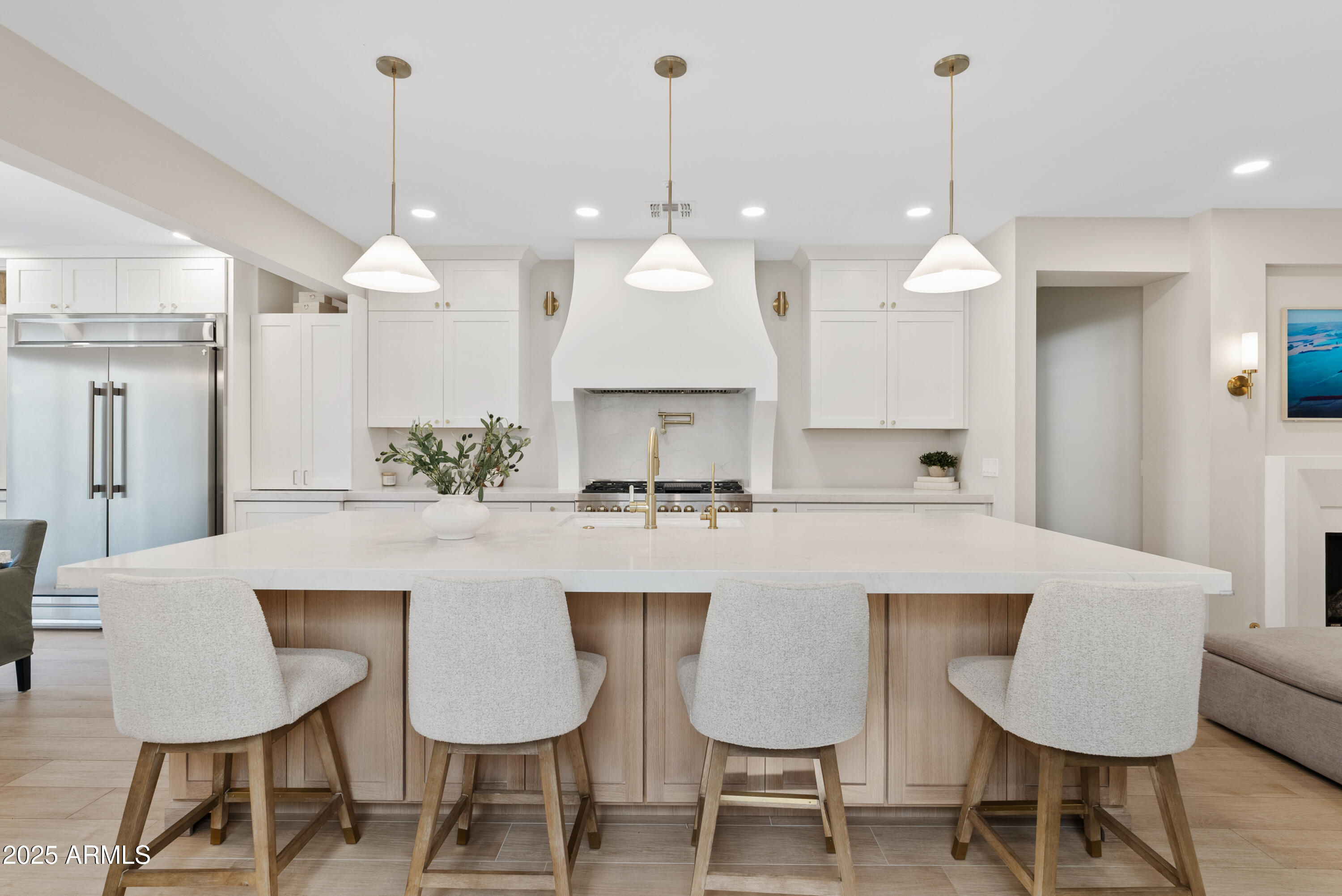Designer kitchen with white oak island