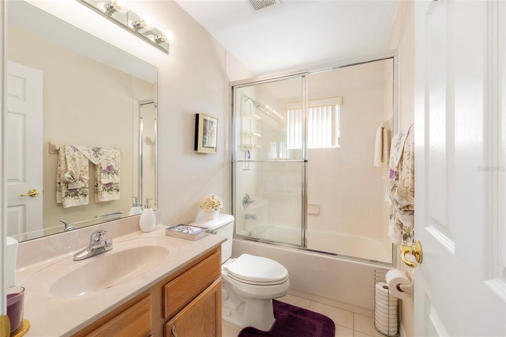 4670 Southwest 158th St Road Ocala, FL 34473 - Photo 17 of 42 a bathroom with a sink toilet tub and shower