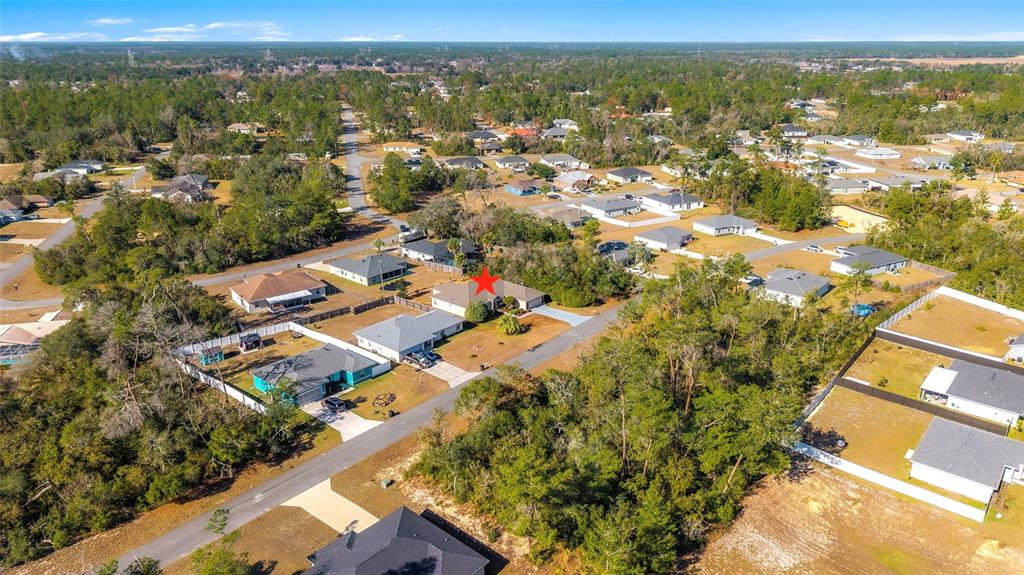 4670 Southwest 158th St Road Ocala, FL 34473 - Photo 39 of 42 an aerial view of residential houses with outdoor space