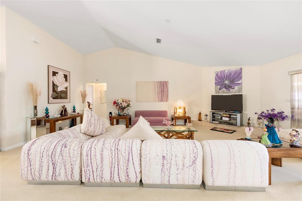 4670 Southwest 158th St Road Ocala, FL 34473 - Photo 6 of 42 a bedroom with two beds and a potted plant