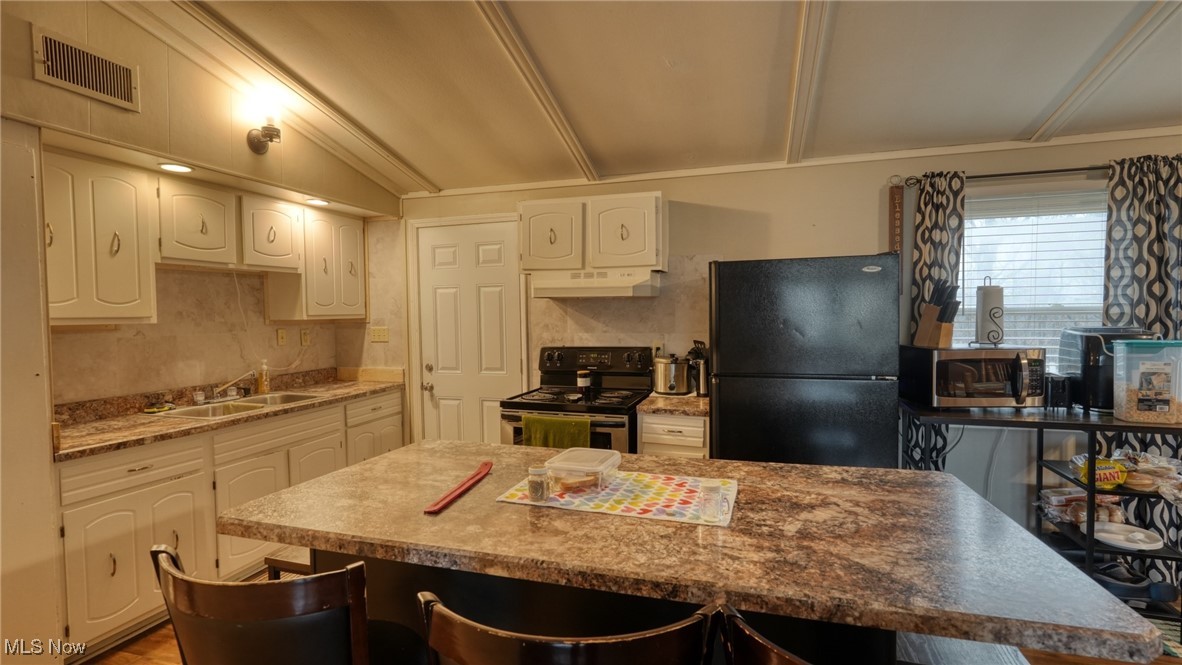 10614 Linwood Road Pleasant City, OH 43772 - Photo 12 of 48 Kitchen featuring a kitchen breakfast island