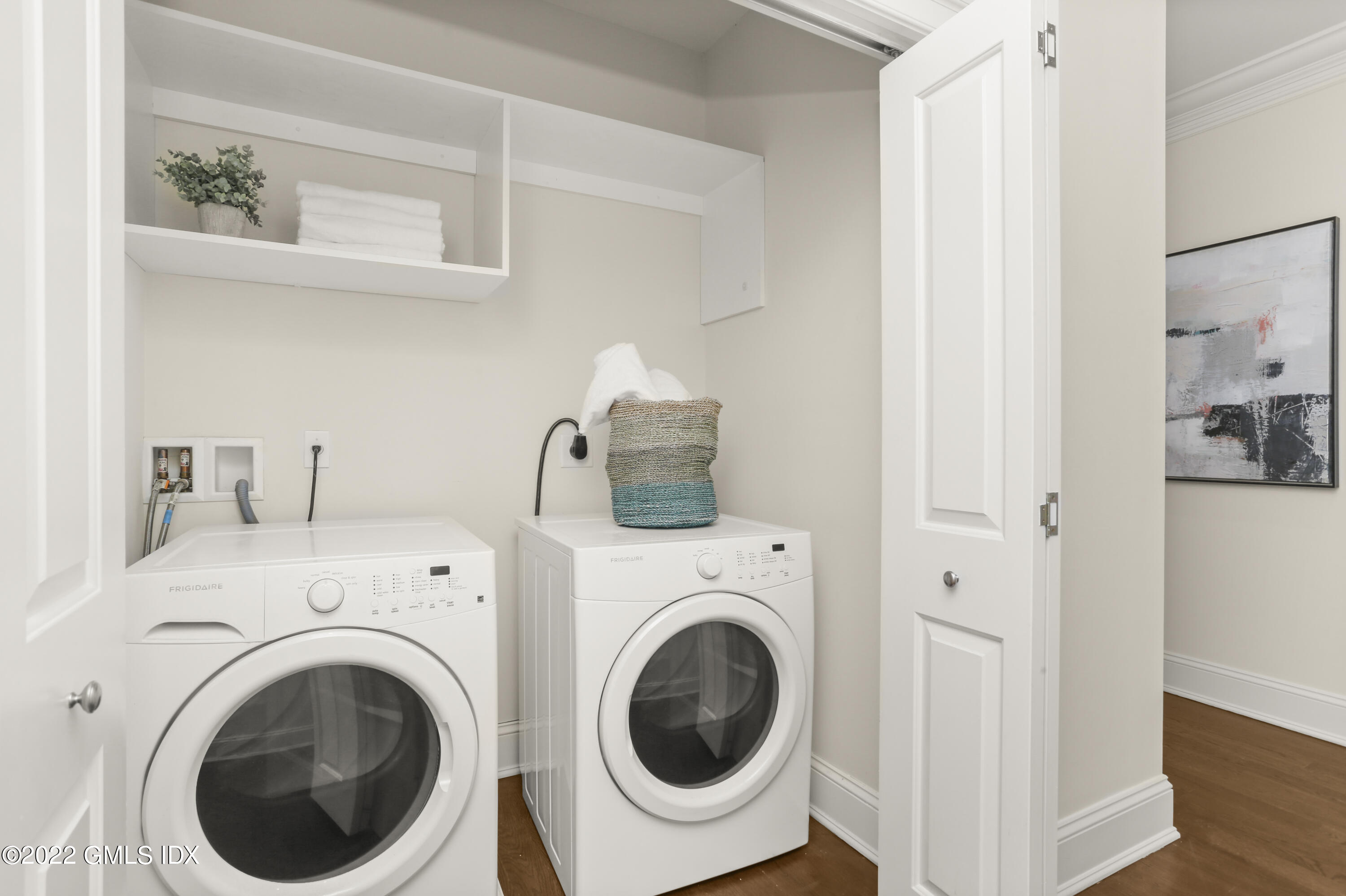 88 South Water Street, Unit 302 Greenwich, CT 06830 - Photo 12 of 21 a utility room with dryer and washer