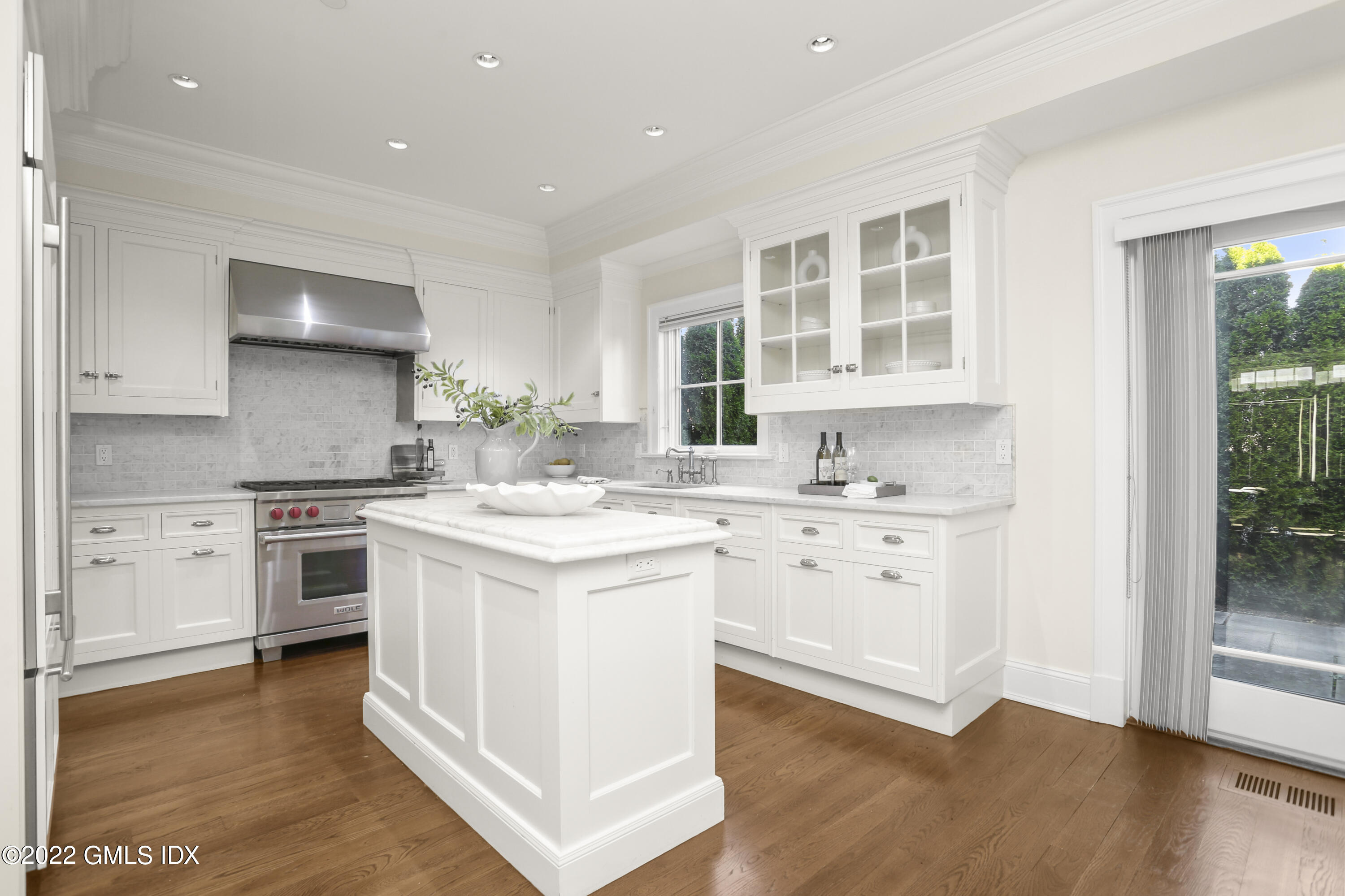 88 South Water Street, Unit 302 Greenwich, CT 06830 - Photo 5 of 21 a kitchen with stainless steel appliances granite countertop a stove and a sink