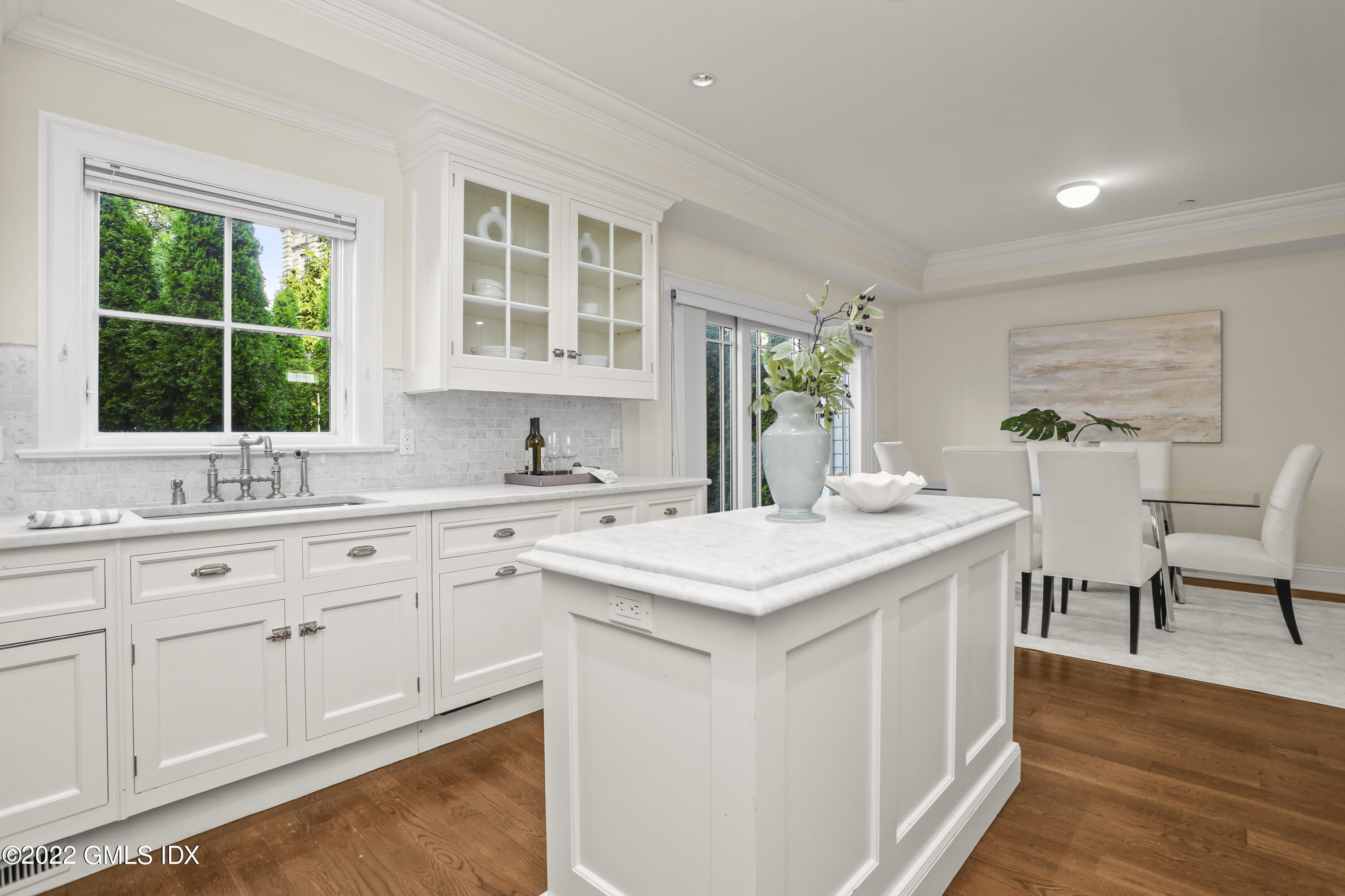 88 South Water Street, Unit 302 Greenwich, CT 06830 - Photo 8 of 21 a kitchen with a sink stove and cabinets