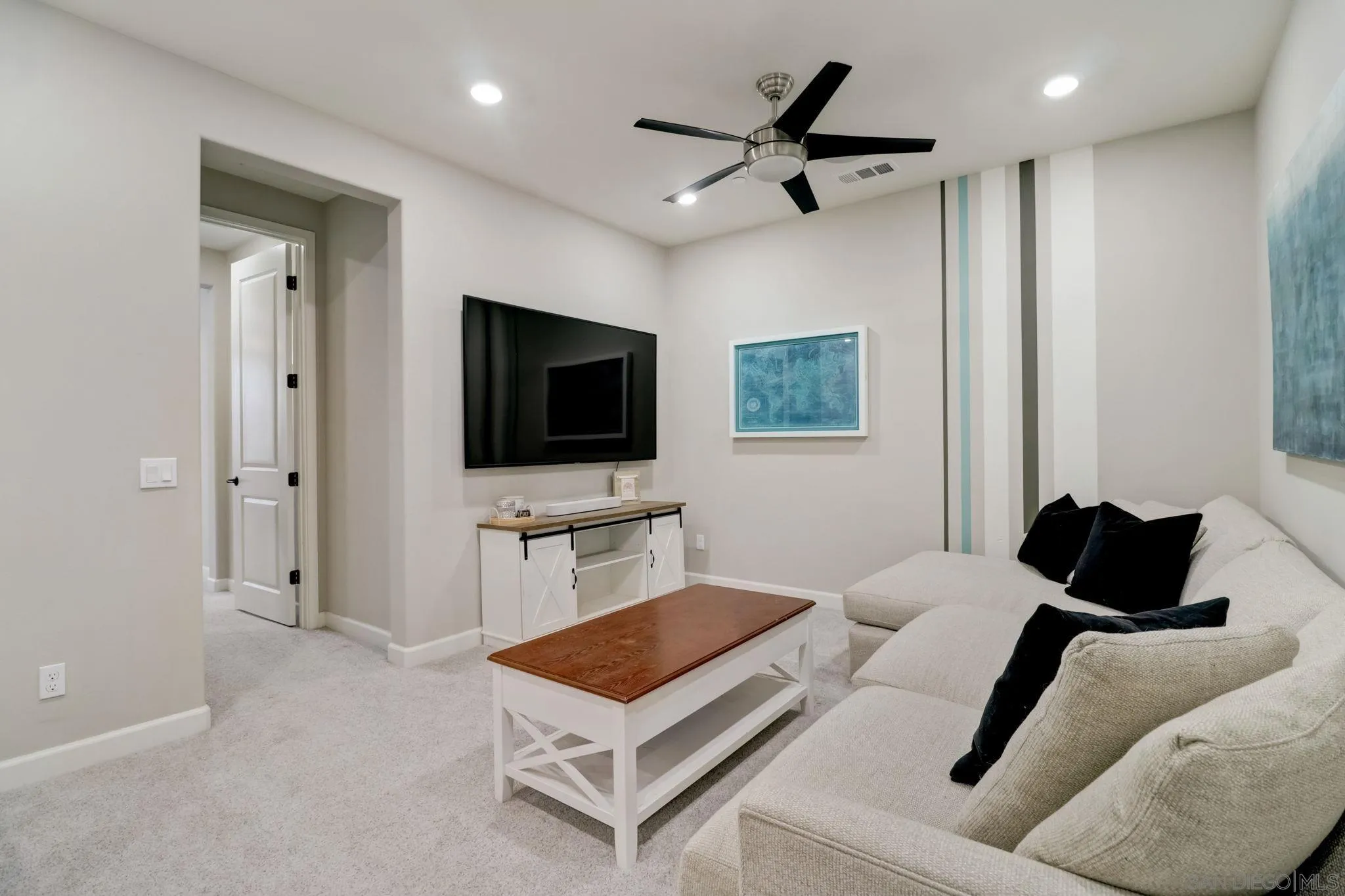 1206 Delpy View Point Vista, CA 92084 - Photo 12 of 29 a living room with furniture and a flat screen tv