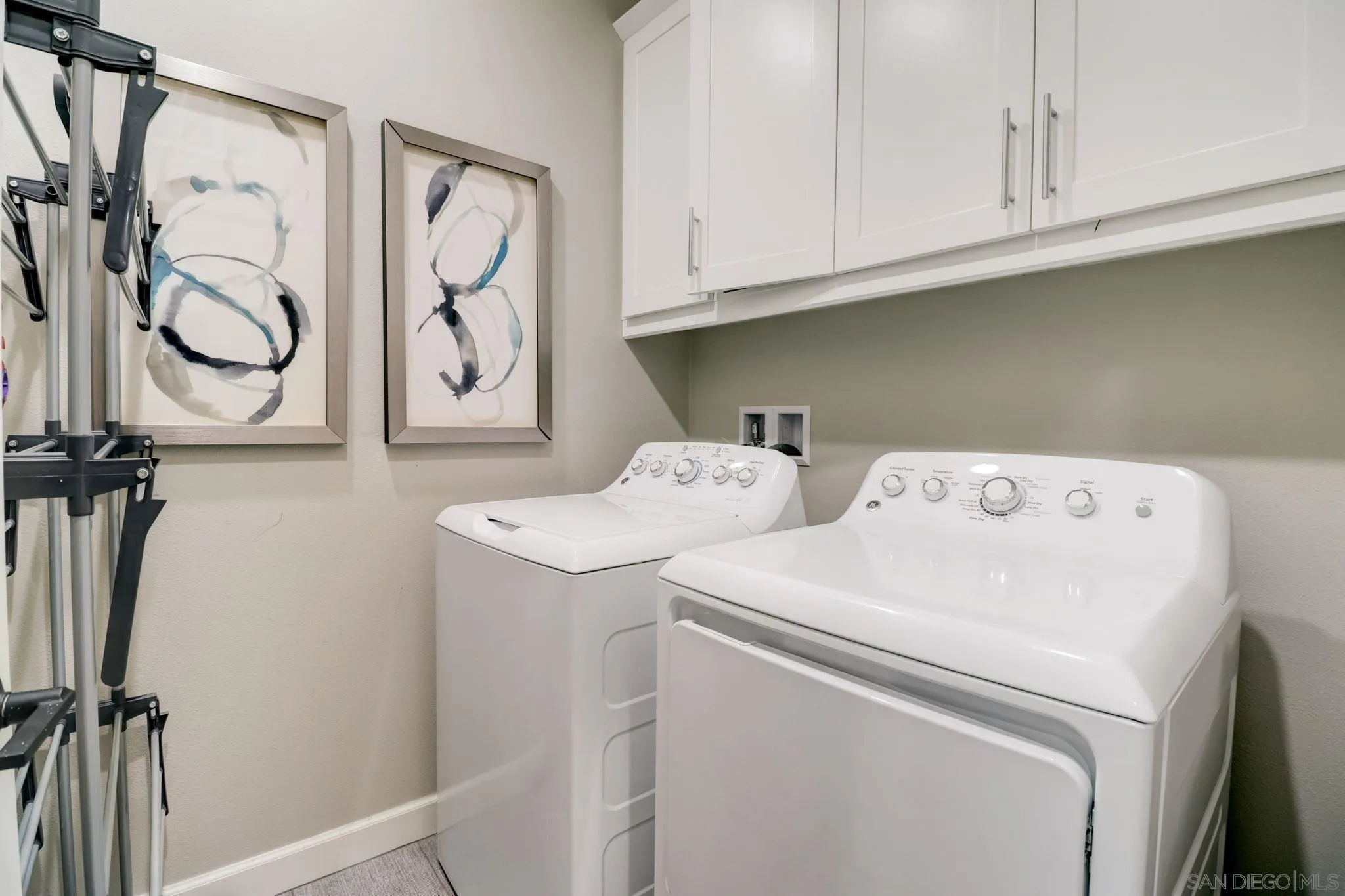 1206 Delpy View Point Vista, CA 92084 - Photo 18 of 29 a utility room with dryer and washer