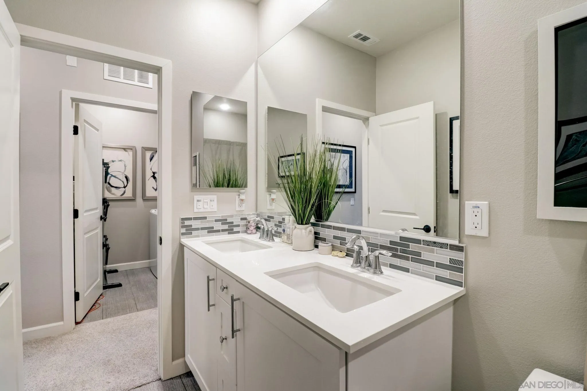 1206 Delpy View Point Vista, CA 92084 - Photo 20 of 29 a bathroom with a sink vanity toilet and shower