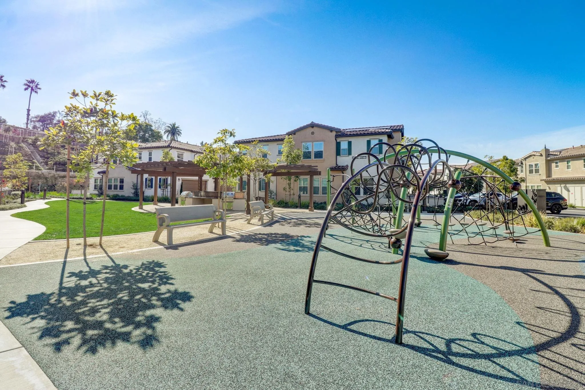 1206 Delpy View Point Vista, CA 92084 - Photo 29 of 29 a view of a swimming pool with a bench and lawn chairs