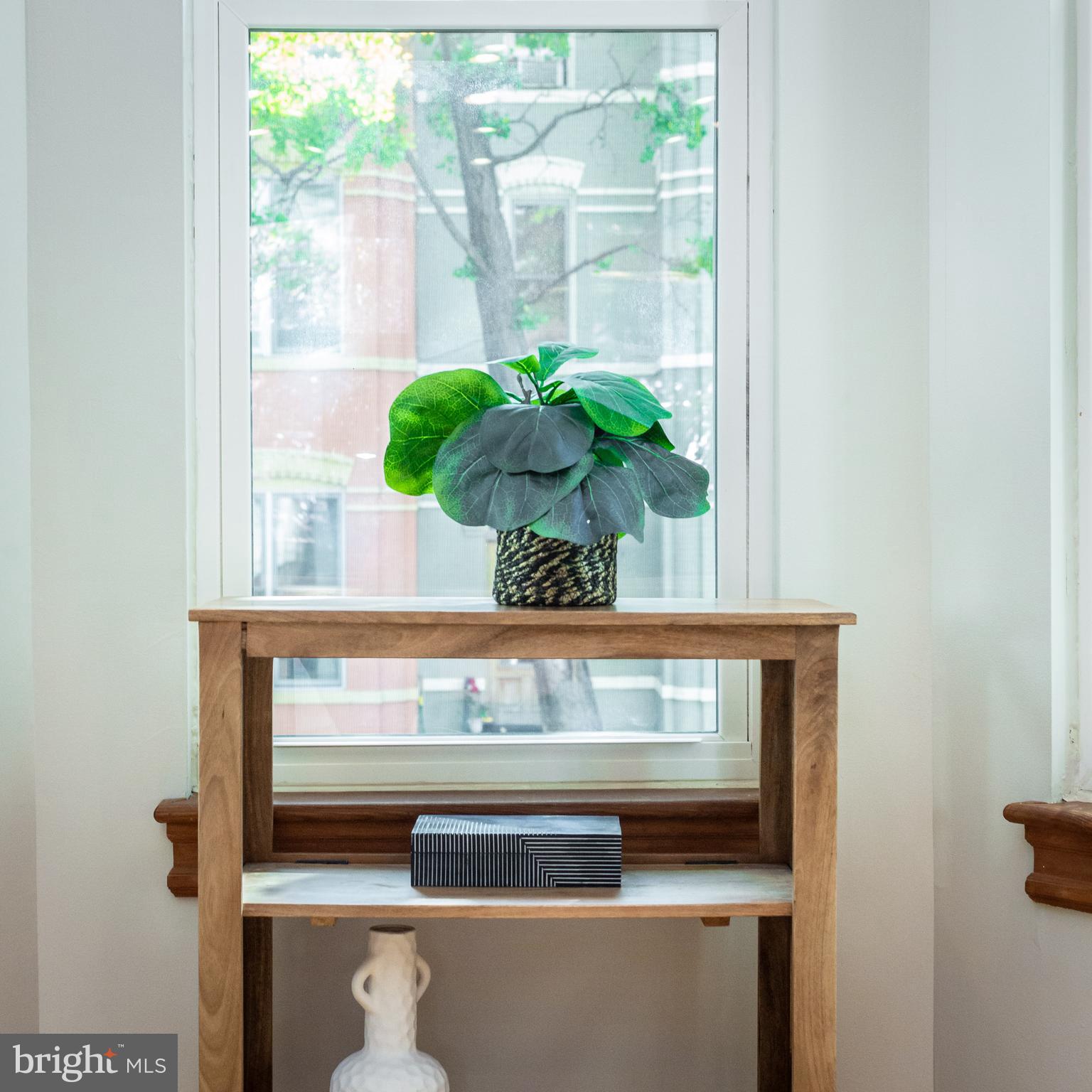 1311 Riggs Street Northwest Washington, DC 20009 - Photo 15 of 101 a view of kitchen with a stove and a window