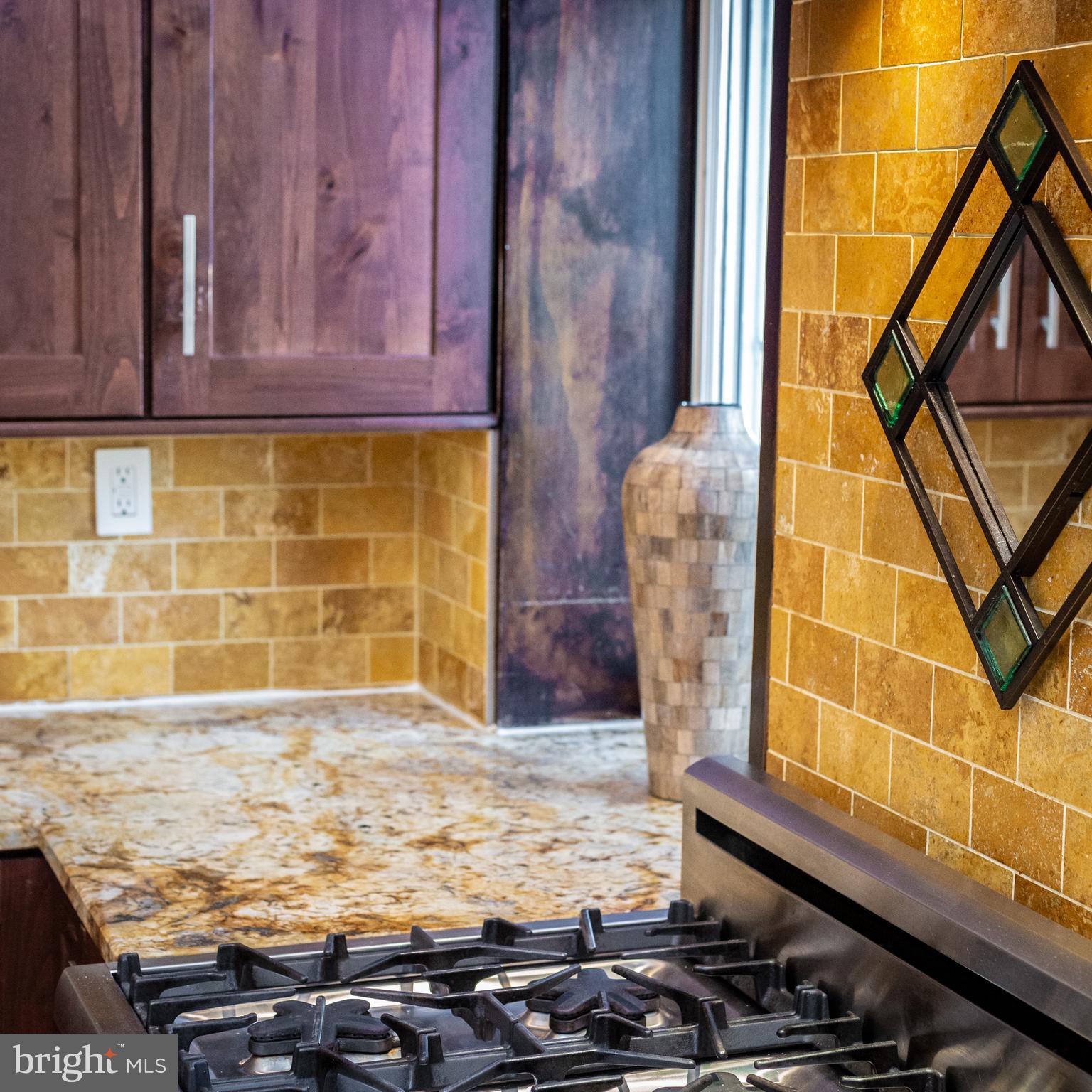 1311 Riggs Street Northwest Washington, DC 20009 - Photo 23 of 101 a bathroom with a granite countertop sink and a mirror