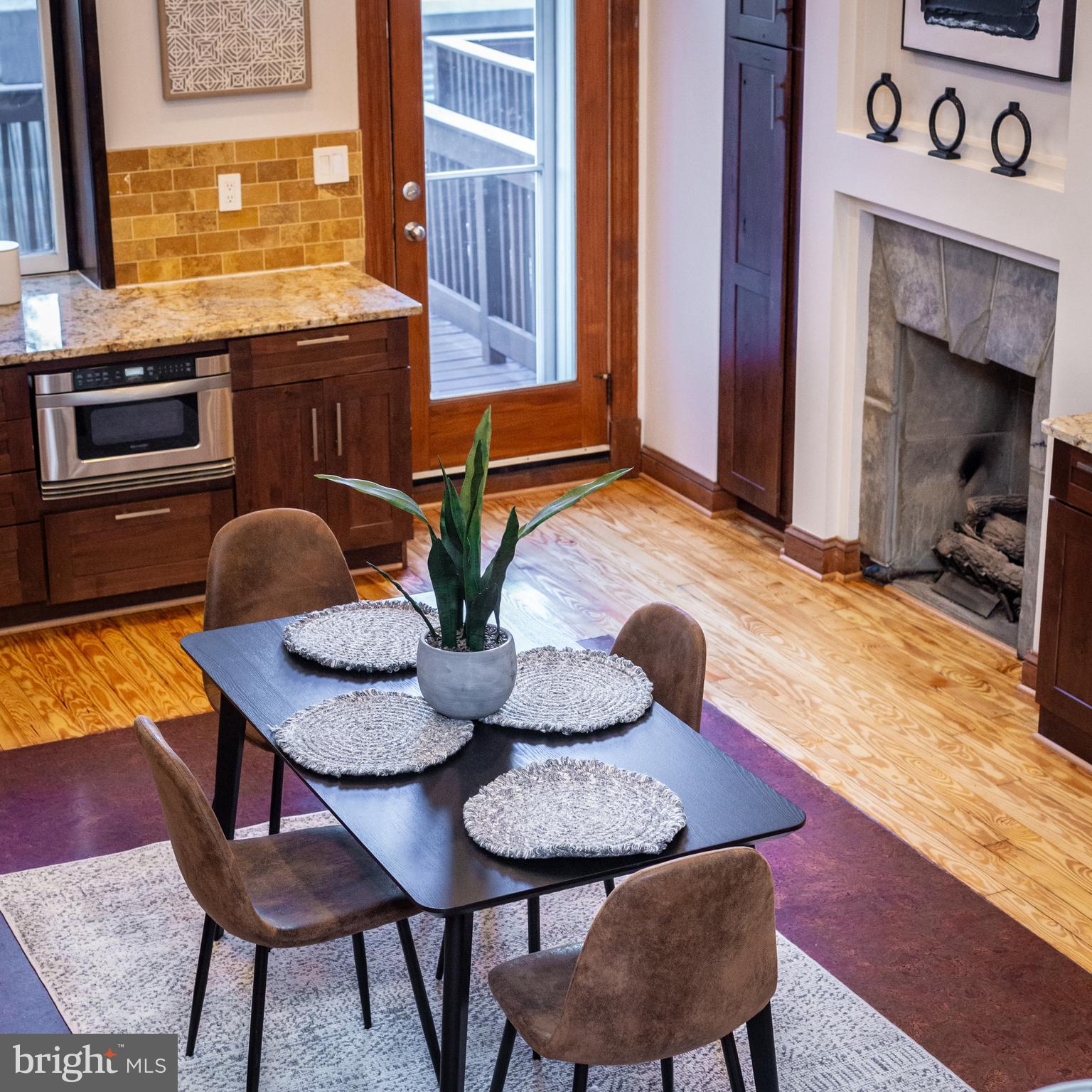1311 Riggs Street Northwest Washington, DC 20009 - Photo 26 of 101 a dining room with furniture and window