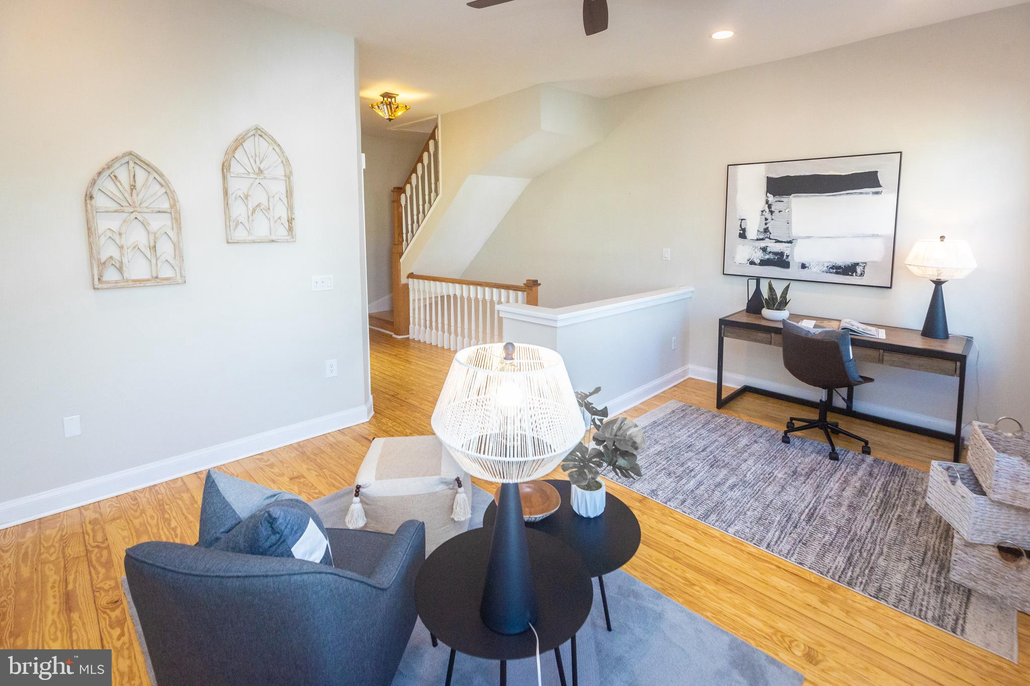 1311 Riggs Street Northwest Washington, DC 20009 - Photo 30 of 101 a living room with furniture and a table
