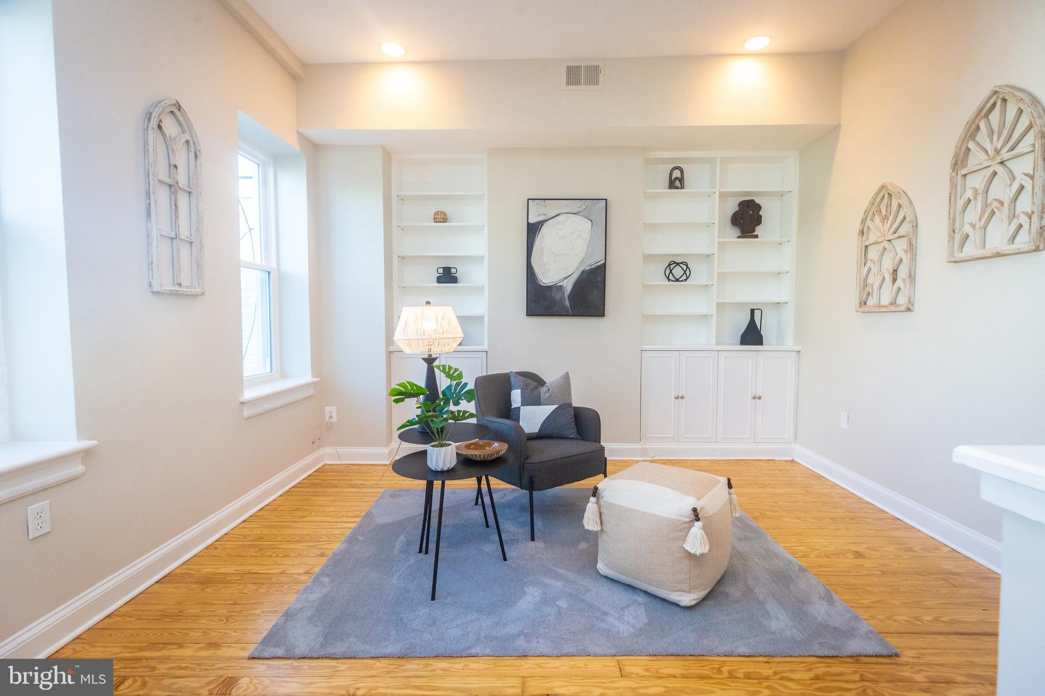 1311 Riggs Street Northwest Washington, DC 20009 - Photo 31 of 101 a living room with furniture and a rug