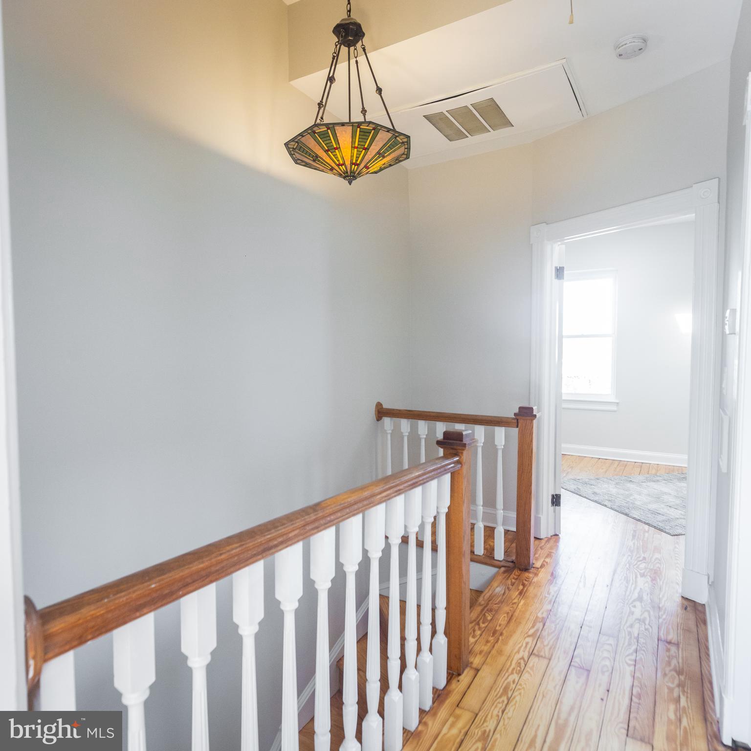 1311 Riggs Street Northwest Washington, DC 20009 - Photo 44 of 101 a view of entryway with wooden floor