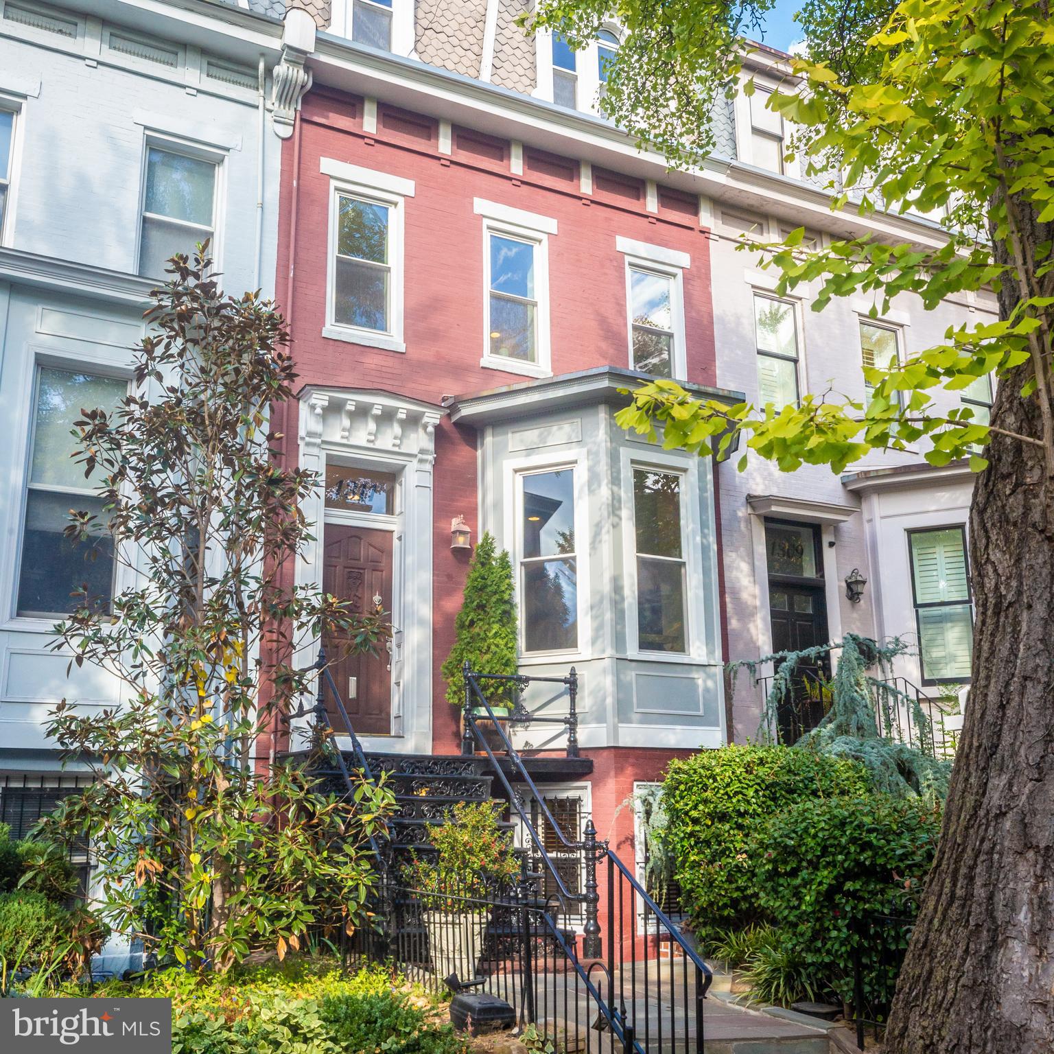 1311 Riggs Street Northwest Washington, DC 20009 - Photo 5 of 101 front view of a brick house with a large window
