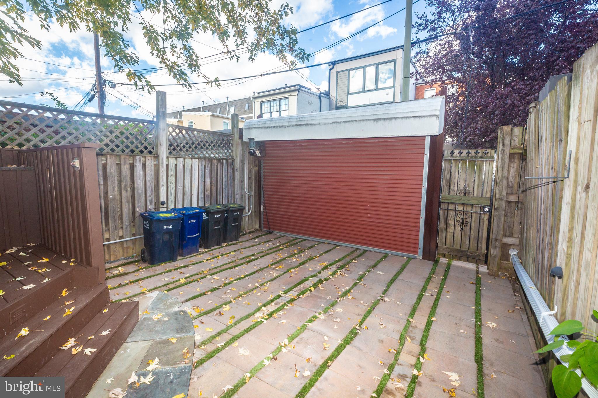 1311 Riggs Street Northwest Washington, DC 20009 - Photo 76 of 101 a view of backyard with a patio